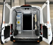 01_The Ford Transit with Syncro racking and cargo bars for a door and window fitter