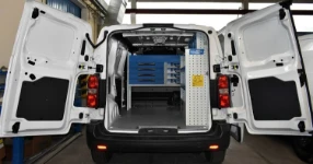 01_The Opel Vivaro with racking on one side and the bulkhead