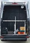 01_The partition separating the storage space which is accessible from the rear
