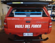 01_The pickup’s canopy with lift-up rear door, showing the Syncro racking system for the fire brigade