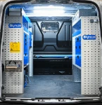 01_The Volkswagen Transporter fitted with drawers, shelves and a vice bench,