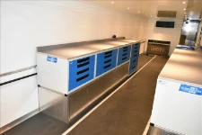02_Syncro System racking on the left of the trailer workshop