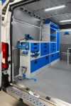 02_Syncro’s work bench, vice, drawers and shelves on the left of the Boxer L2 H2