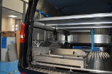 02_The coffin slide on the left of the undertakers’ van