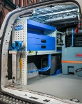02_The Doblò’s pull-out vice bench with support and the Ecoflow unit