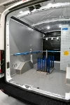 02_The glass support frame and lashing accessories in the glazier’s Transit