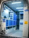 02_The left of the Sprinter with workbench, metal drawers and transparent containers
