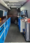 02_The mobile workshop in the Sprinter, with Syncro racking