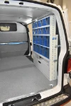 033_Syncro’s patented transparent plastic containers on the right of the second VW Transporter