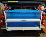 03_Open shelves with lift-and-rotate doors in the pickup