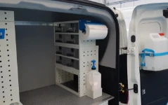 03_Pull-out transparent containers and cleaning accessories on the right of the Doblò