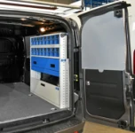 03_Syncro’s tilting transparent containers on the right of the Fiat Doblò