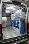 03_Syncro’s workshop area with worktop and vice bench on the right of the Daily