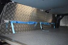 03_The bar with hooks and strap on the left of the van