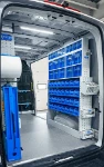 03_The blue plastic and transparent containers on the right of the plumber’s MAN TGE