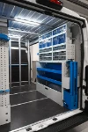 03_The Ducato’s pull-out and tilting transparent containers and vice bench