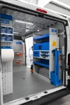 03_The fold-away vice bench, shelves and cases on the right of the Ducato