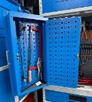 03_The panel opened to reveal additional storage inside the door