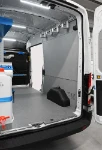 03_The Transit’s right wall, free apart from a Syncroblock bar with movable, telescopic hooks