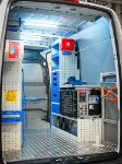 03_The workbench, generator, vice and drawers on the right of the Sprinter