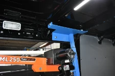 04_A close-up of the support post showing how it is fixed to the van’s body