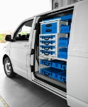 04_Cases on trays and shelves, drawers and removable containers accessible through the left side door