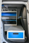 04_The cargo retaining accessories and underfloor drawer unit at the Doblò’s bulkhead
