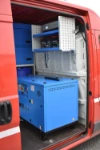 04_The compressor-generator and overhead racking on the van’s bulkhead