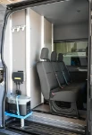 04_The custom-made frame with Ecoflow unit and battery charger in the Sprinter for motorcycle trials