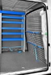 04_The Ducato’s bulkhead with two cargo retaining bars with straps and sliding attachments