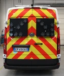 05a_The exterior of the Deliver9 with high-vis finish and signalling lights (example 2)
