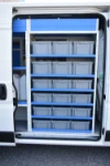 05_Shelves and a floor-level compartment with a lashing strap on the bulkhead