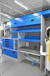 05_The stainless-steel tray for carrying liquids over the Crafter’s case compartment