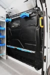 05_The Transit’s bulkhead, with the Syncroblock bar, cable holders and hook and strap lashing systems