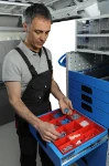 11_A drawer with modular plastic containers