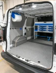 22_Cargo retaining and cleaning accessories on the left of the Custom