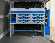 55_Case trays and shelves in the bulkhead racking of the Custom L1 H1