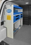 A case compartment, shelves and drawers in the Caddy