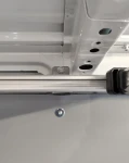 A close-up of a Syncroblock bar for hanging garments