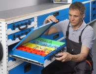 A component case on an extended tray