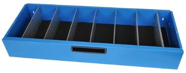 A drawer with aluminium dividers