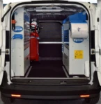 A Fiat Doblò with racking for servicing farm machinery