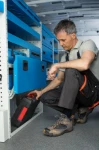 A floor-level compartment with a door