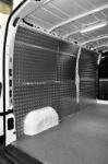 A floor liner in resin-coated marine plywood and wall liners in aluminium tread plate