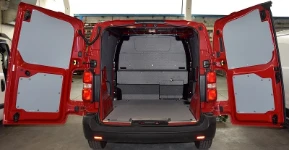 A floor liner in rubber-coated plywood and bodywork liners in a Citroen Jumpy