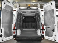 A high grip floor liner and aluminium chequer plate body liner in a Master