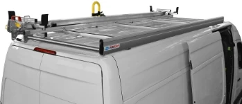 A ladder slide on a MAN TGE roof rack with rear roller and side fences