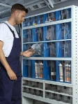 A large tilting drawer in a van racking system