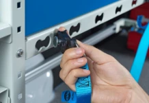 A lashing strap attached to the racking