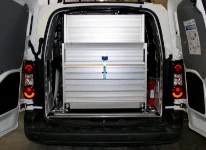 A loading ramp with an extension for a low-roof van